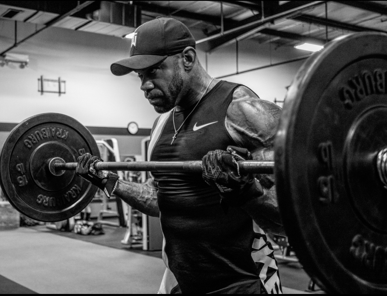 Steve McKinney training with a barbell in the gym
