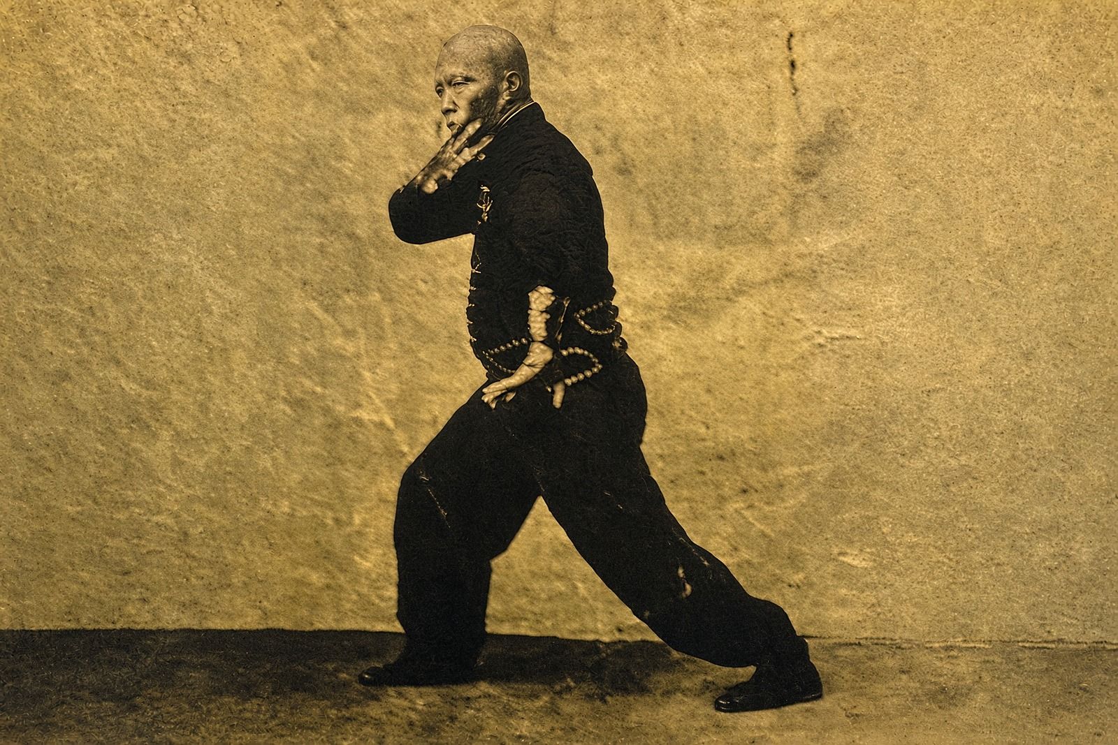 Vintage photo of a Hung Gar master in a low palm stance
